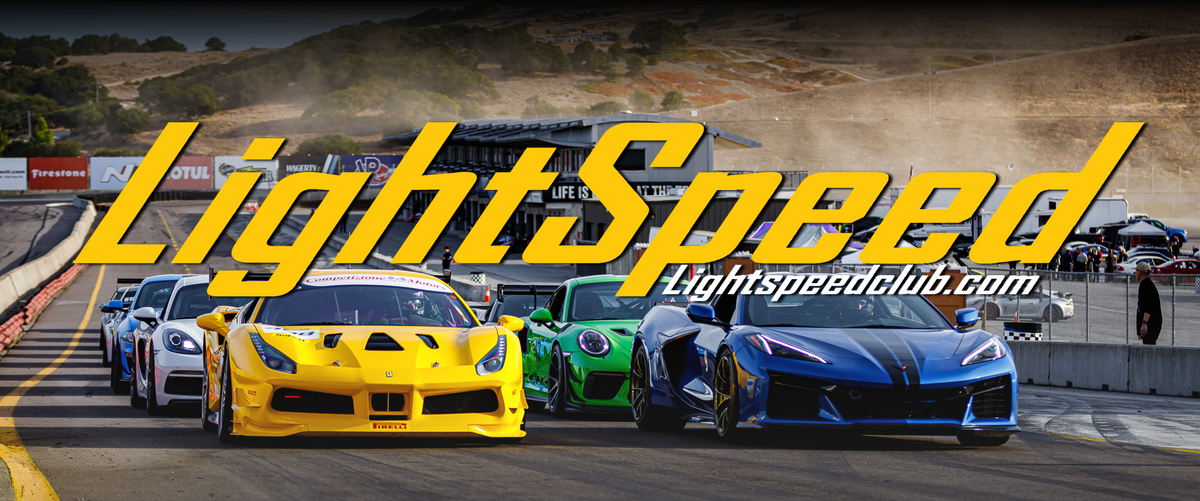 LightSpeed Club logo over sports cars lined up on the grid